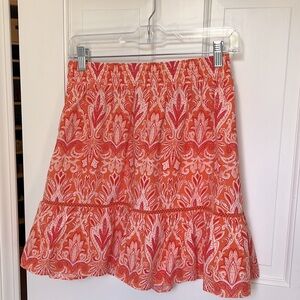 Size XS loft skirt. Orange/white with paisley pattern